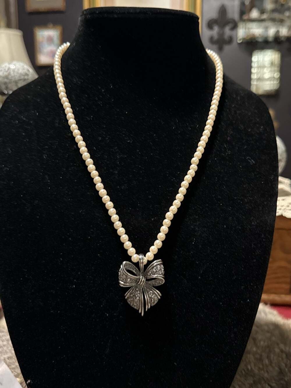 Vintage Avon Cream Faux Pearl Necklace With Textured Silver Tone 3D Ribbon